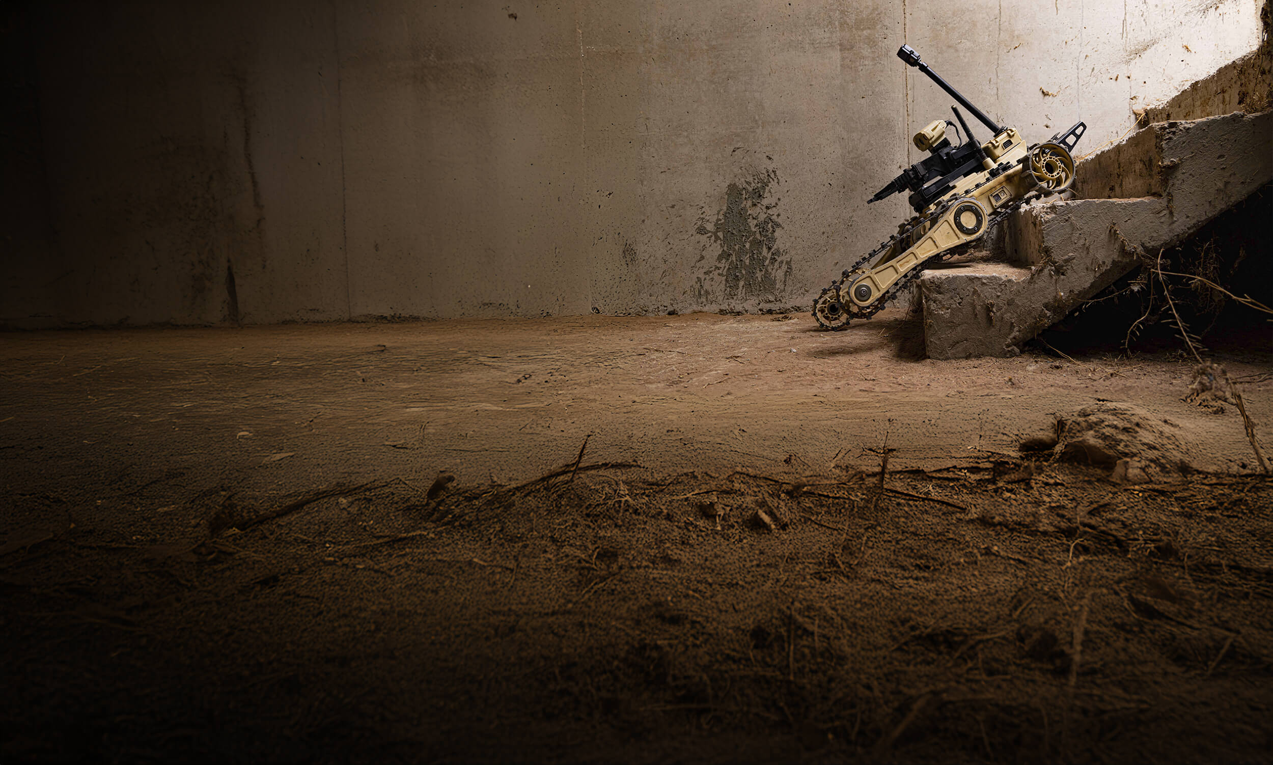 Remote controlled robot tank climbing stairs